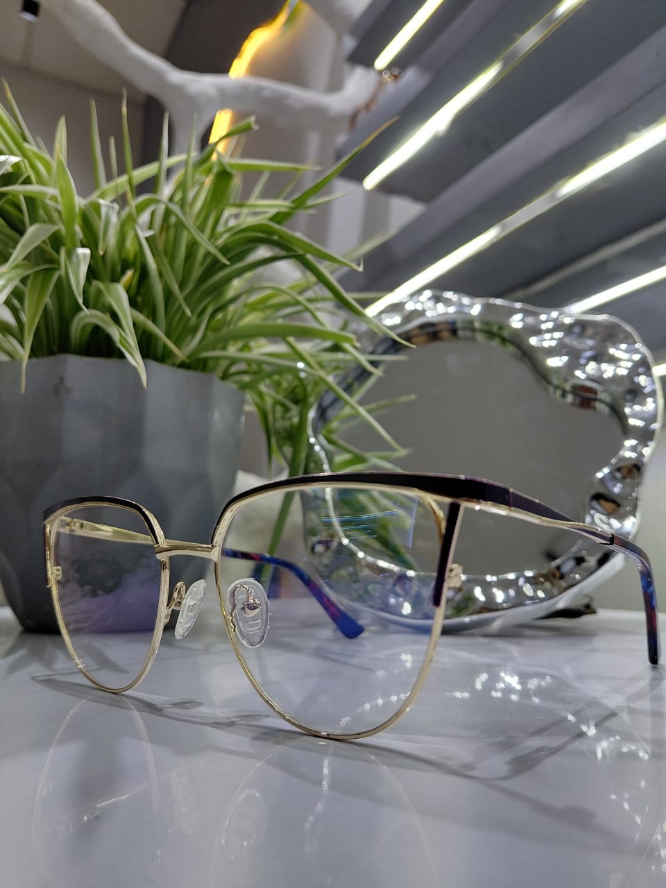 OPTICLINIC METAL